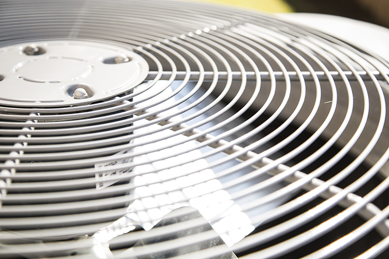Top view of an air conditioner unit outdoors in hot summer season. No people.